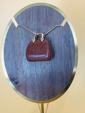 Brown druzy Quartz  purse pendant plus a gold plated necklace